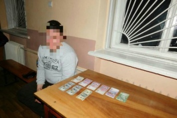 В Донецкой области майор полиции отказался от взятки - взяткодателя будут судить (ФОТО)