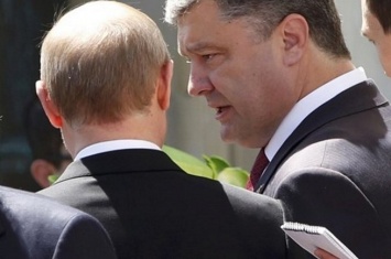 Порошенко с Путиным обсудили перемирие на Донбассе