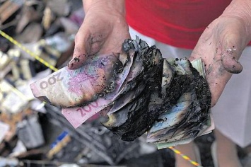 В Донецкой области переселенцы долго не могли обменять обгоревшие денежные купюры