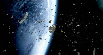 NASA создаст устройство для уборки космического мусора размером с бумажный лист