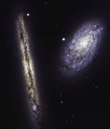 Телескоп Hubble прислал на Землю уникальное фото двух спиральных галактик