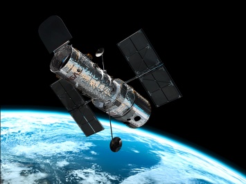 Телескоп Hubble обнаружил луну вокруг третьей по величине карликовой планеты