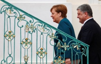 О чем умолчал Порошенко после встречи с Меркель
