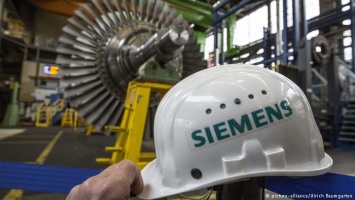 Siemens ограничивает деятельность в России в ответ на "крымский скандал"