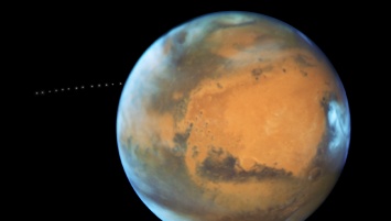 "Хаббл" снял на видео Фобос, вращающийся вокруг Марса