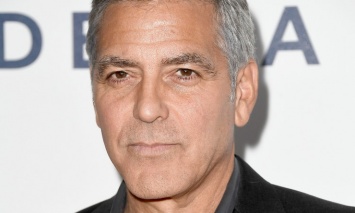 Джордж Клуни хочет засудить папарацци, заснявших его детей