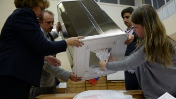 "Ни одного нарушения": иностранные эксперты оценили выборы в России