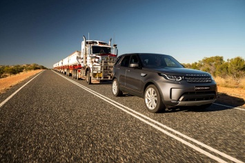 Может ли Land Rover Discovery буксировать 120-тонный автопоезд [видео]