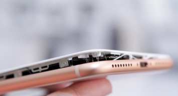 Батарея iPhone 8 Plus раздувается во время зарядки