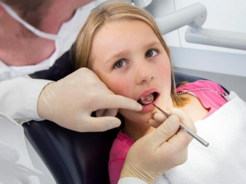 Проверки у стоматолога защищают маленьких детей от угрозы ожирения