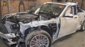Не бита, не крашена: чудесное восстановление разбитой BMW 7 (видео)
