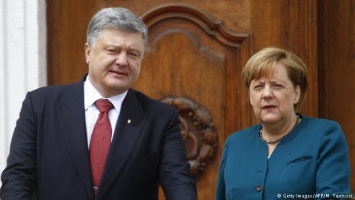 Меркель и Порошенко надеются на скорейший обмен пленными в Донбассе