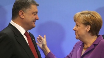 Меркель и Порошенко обсудили конфликт в Украине