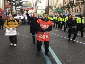 В Сеуле устроили протесты против "пропаганды" и КНДР на Олимпиаде