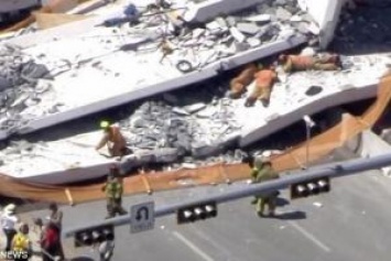 Жуткая трагедия в Майами: пешеходный мост рухнул на проезжающие машины