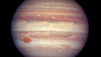 В розовом цвете: NASA опубликовало фото бури на Юпитере