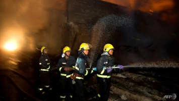 В результате пожара в китайском караоке-бара погибли 18 человек