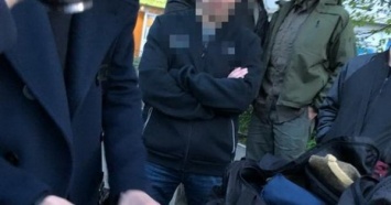Взятка, пистолет и кокаин: в Киеве задержали судью и его бывшего коллегу