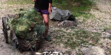На Кременчугском море задержали женщину-браконьера (ФОТО)