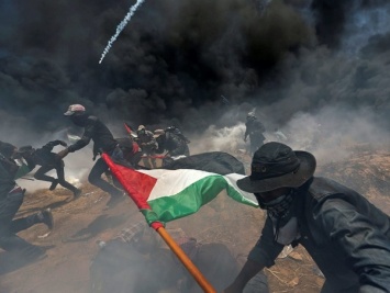 На границе Газы и Израиля погибло 59 палестинцев