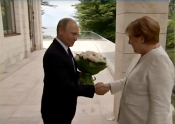 Путин и Медведев встретили Ангелу Меркель в Сочи. Фото
