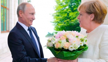 Путин - Меркель: Россия не против миротворцев, но выдвигает свои условия