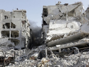 Сирийские государственные СМИ обвинили авиацию США в ударе по позициям армии Сирии