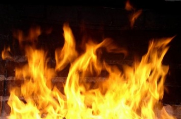В Запорожье 10 спасателей боролись с пожаром на балконе