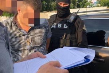 Полковника полиции в Луцке задержали на взятке в 3 тысячи долларов
