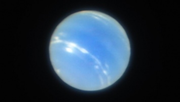 Наземный телескоп впервые получил сверхчеткие фотографии Нептуна