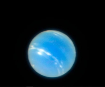 Впервые телескоп с Земли получил четкие снимки Нептуна