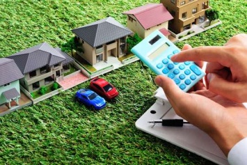 Как украинцы в этом году будут платить налоги на недвижимость и авто