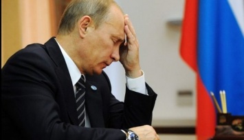 В России зафиксировали снижение рейтингов Путина и Медведева