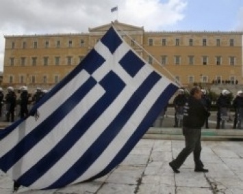Власти ЕС требуют от Греции сокращения госдолга