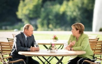 Путин и Меркель обсудили Украину тет-а-тет