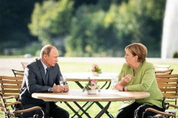 Меркель выучила русский ради Путина