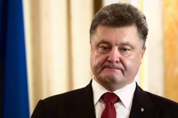 «Убийство Захарченко»: Порошенко может ввести военное положение и остаться у власти