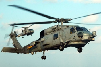 Американский вертолет упал на палубу ядерного авианосца