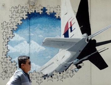 Обломки MH370 охраняют «головорезы под наркотиками» - конспирологи