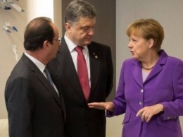 Меркель пригласила Порошенко пожать руку Путину (видео)