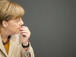 Bild: Меркель встала на защиту миграционной политики Германии