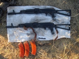 В Красногоровке Донецкой обл. правоохранители нашли тайник с боеприпасами и оружием