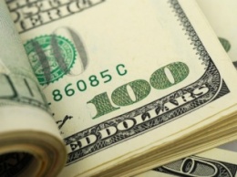 Эксперт: Доллар на этой неделе преодолеет психологический барьер