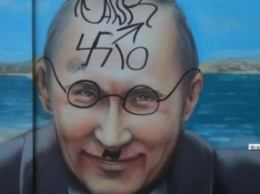 В Керчи неизвестные в очередной раз испортили граффити с Путиным