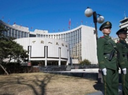 Народный банк Китая на год снизил процентную ставку по депозитам и кредитам