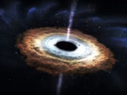 Массивная черная дыра поглощает звезду