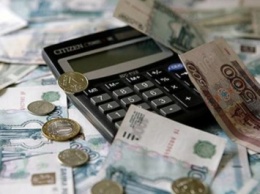 На зарплаты учителям и врачам в 2016 году выделят на 33 млрд рублей меньше