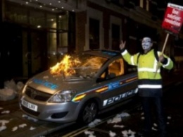 В Лондоне прошли столкновения между полицией и участниками "Марша миллиона масок"