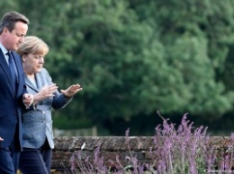 Меркель готова обсудить предложения Кэмерона по реформированию ЕС