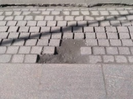 В Киеве разрушаются отремонтированные дороги